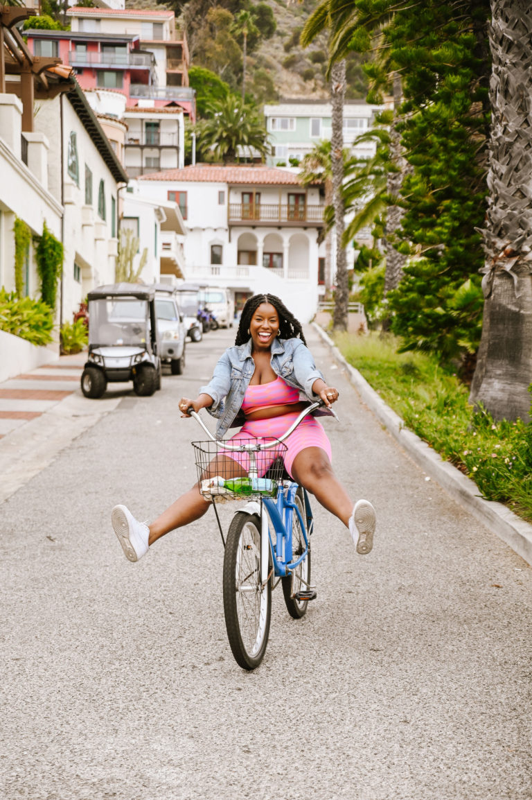 Woman riding a beach cruiser on Catalina Island