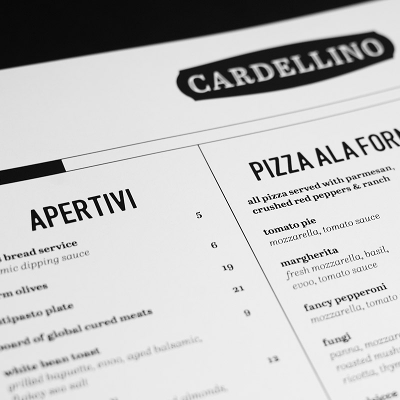 Black and white Cardellino restaurant menu featuring Apertivi and pizzas such as tomato pie, margherita, fancy pepperoni, and fungi