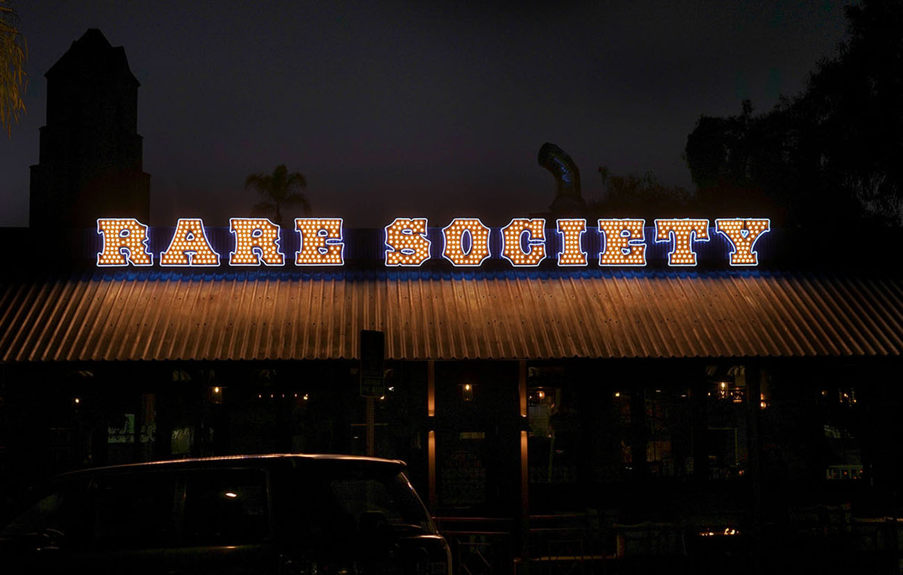 Rare Society sign lit